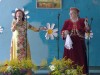 Творческий дуэт Валентины Куриновой и Натальи Ошитковой исполняют песню «Женщины все королевы!» для жителей с. Карабатово