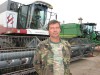 Летом механизатор племзавода Андрей Владимирович Поршнев пересаживается с трактора на комбайн